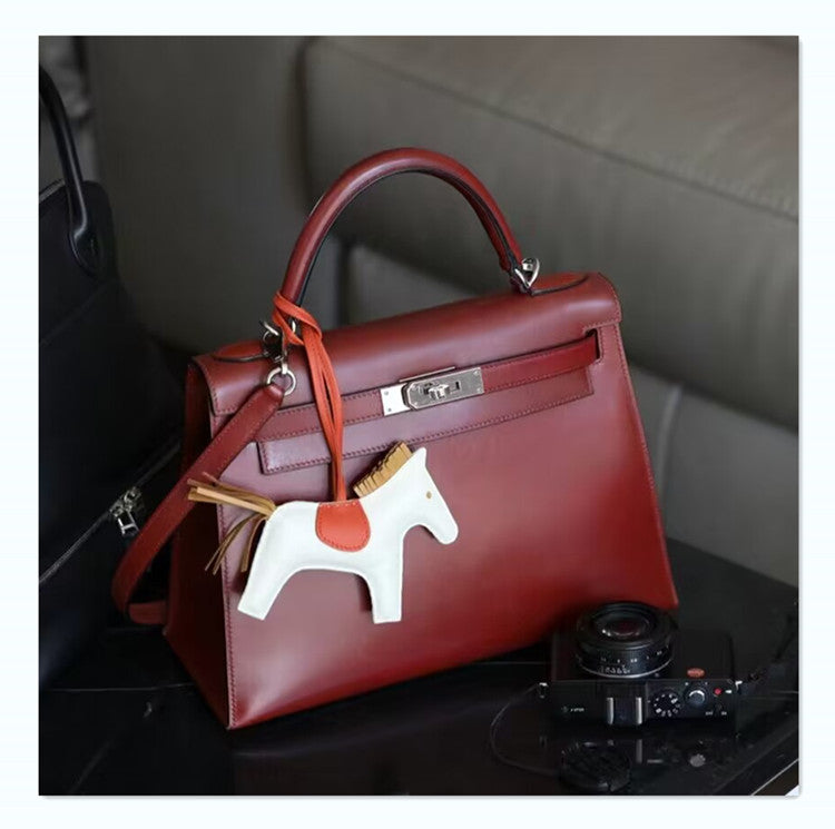 Women’s Glossy Leather Lock Shoulder Bag