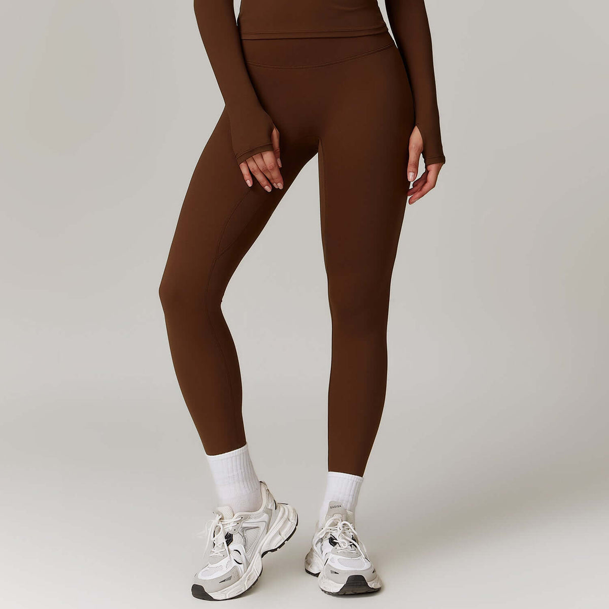 High-Waist Hip-Lifting Yoga Pants in brown, ideal for yoga, dance, and workouts with a flattering fit.