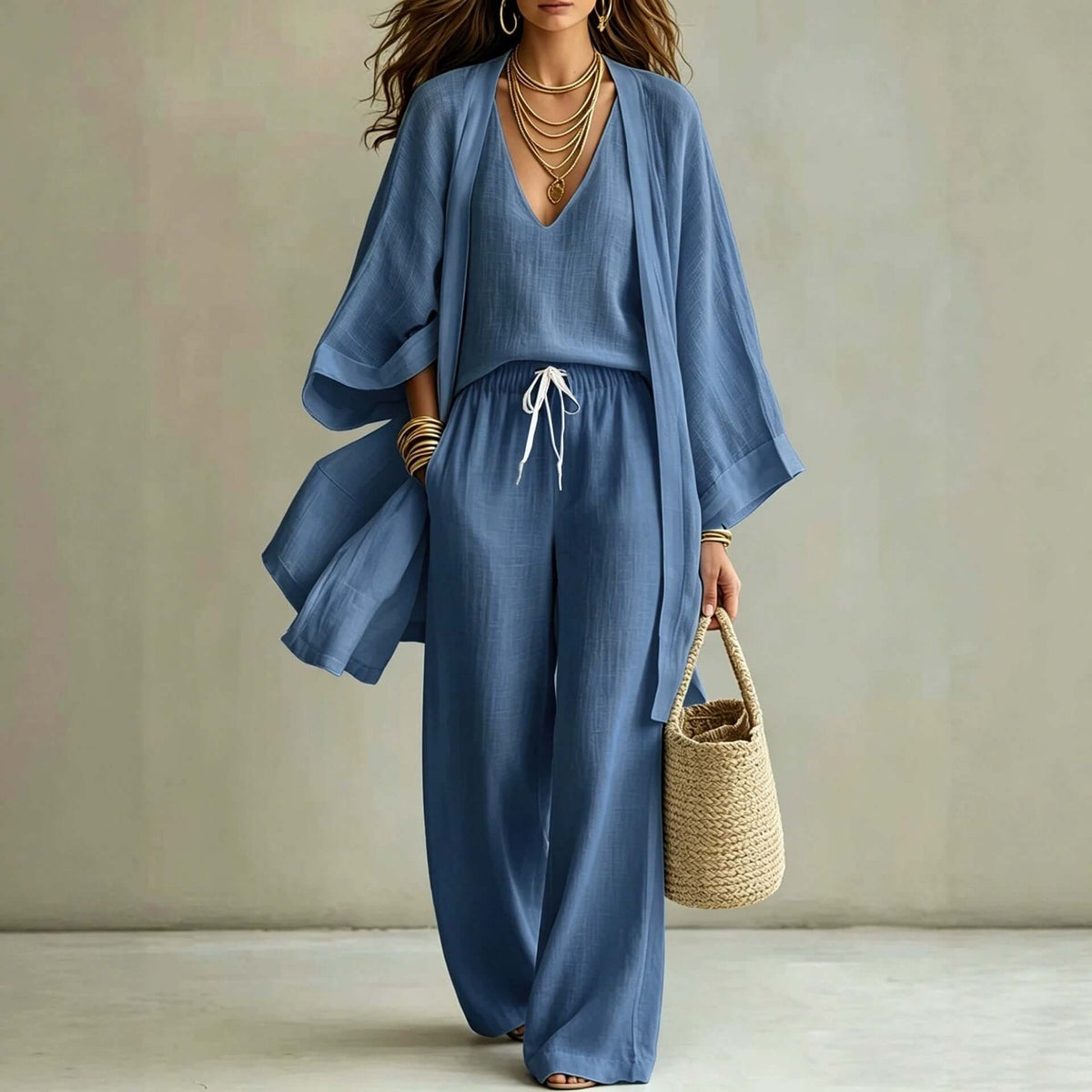 Women's 3-piece cardigan set featuring a stylish cardigan, sleeveless vest, and wide leg pants in a chic blue color.