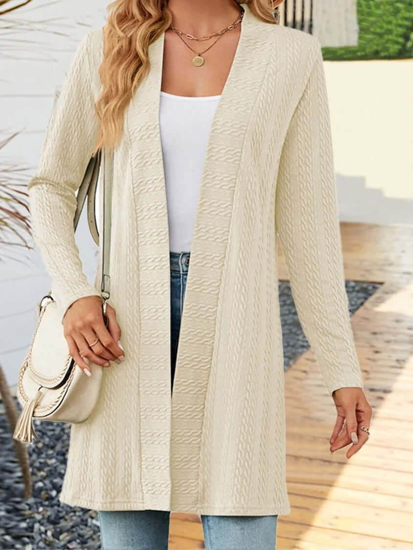 Women's knit cardigan featuring a button-down design and a relaxed silhouette, ideal for layering.