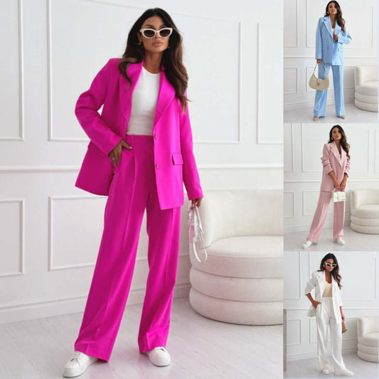 Women's professional blazer trousers suit set in vibrant pink, showcasing a modern fashion style with long sleeves and full-length trousers.