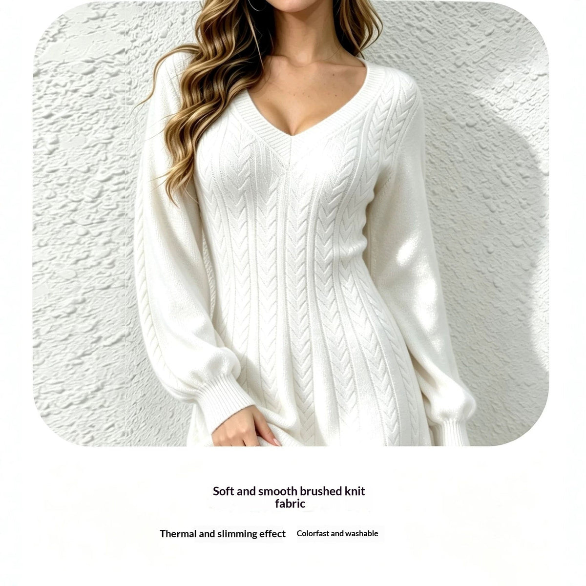 Close-up of the cream cable-knit dress showing the soft brushed knit fabric texture