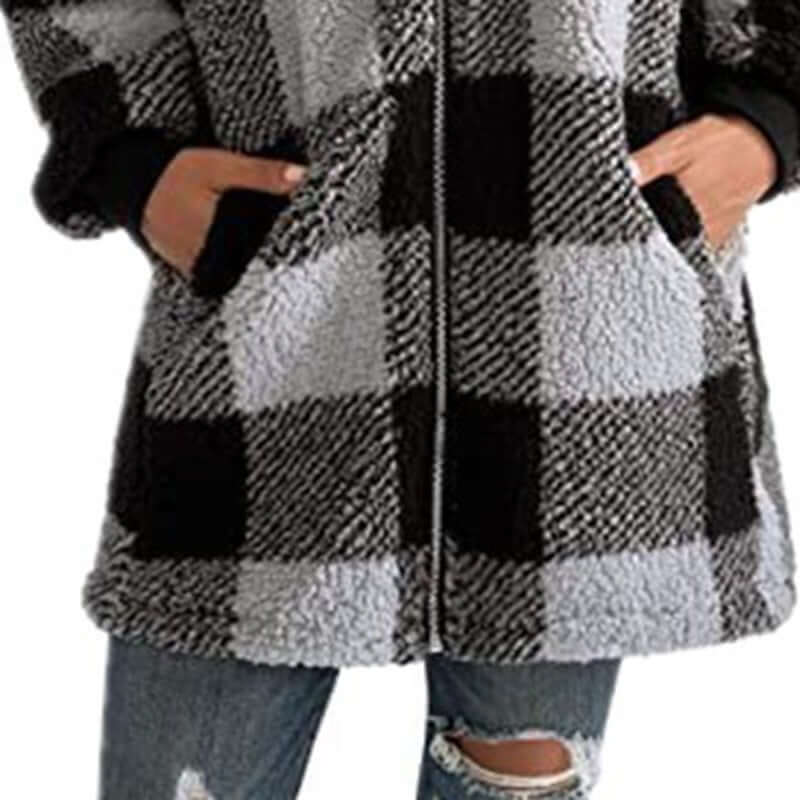 Plaid oversized winter jacket with pockets and full zipper, perfect for cozy winter commutes.