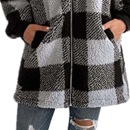 Plaid oversized winter jacket with pockets and full zipper, perfect for cozy winter commutes.