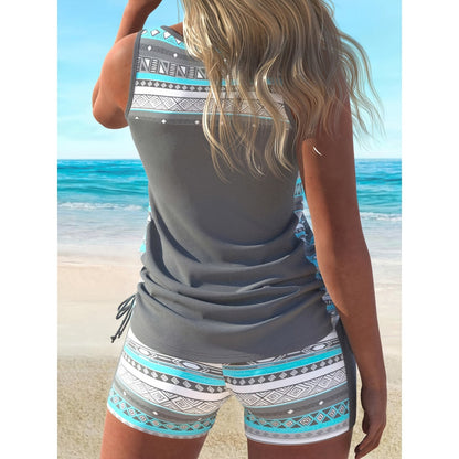 Woman in a plus size Aztec print tankini set standing by the beach, showcasing the stylish back design and comfortable fit.