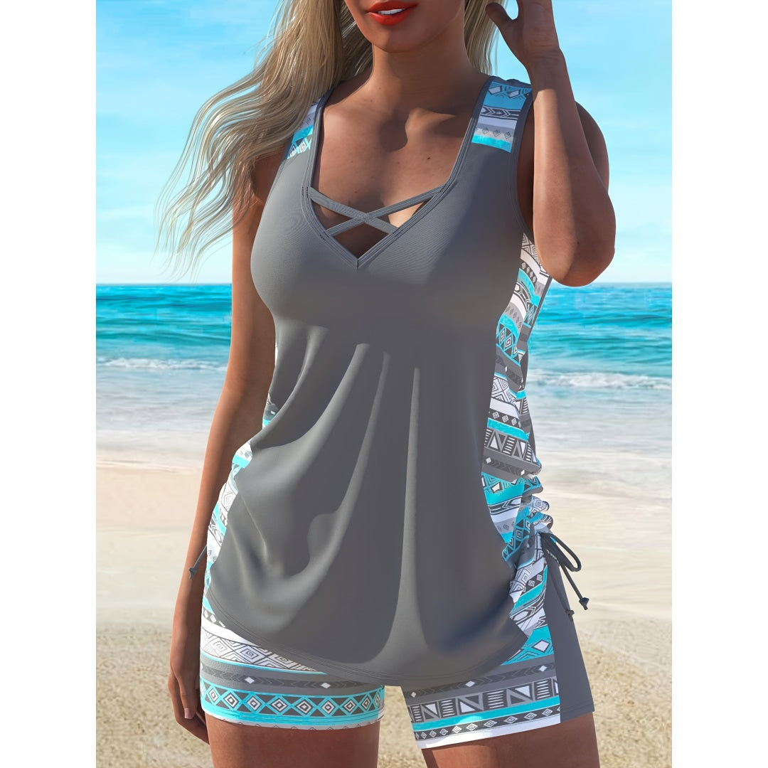 Plus size Aztec print tankini set featuring a stylish V-neck design and cross-strap detail, perfect for beachwear.