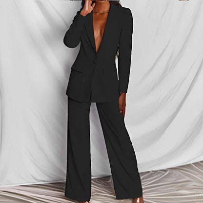 Women's professional blazer trousers suit set in black, showcasing a tailored long-sleeve blazer and full-length trousers.