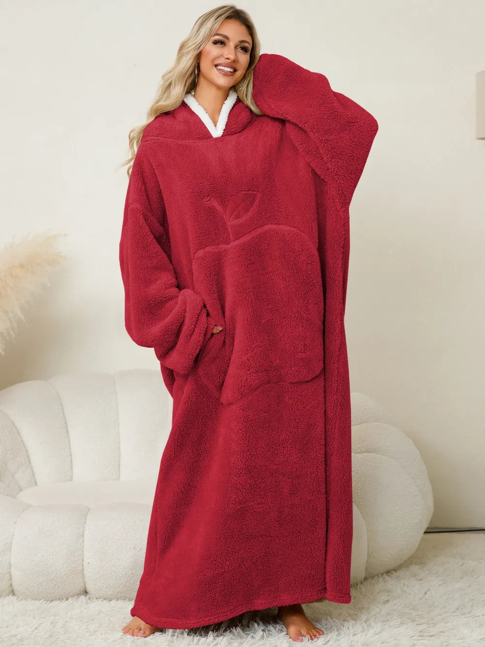 women's hooded lounge dress in cozy red fabric, featuring a large pocket and relaxed fit for ultimate comfort.