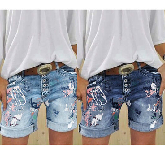 Stylish Women's high-waist printed denim shorts with button closure, featuring a trendy print and comfortable fit.