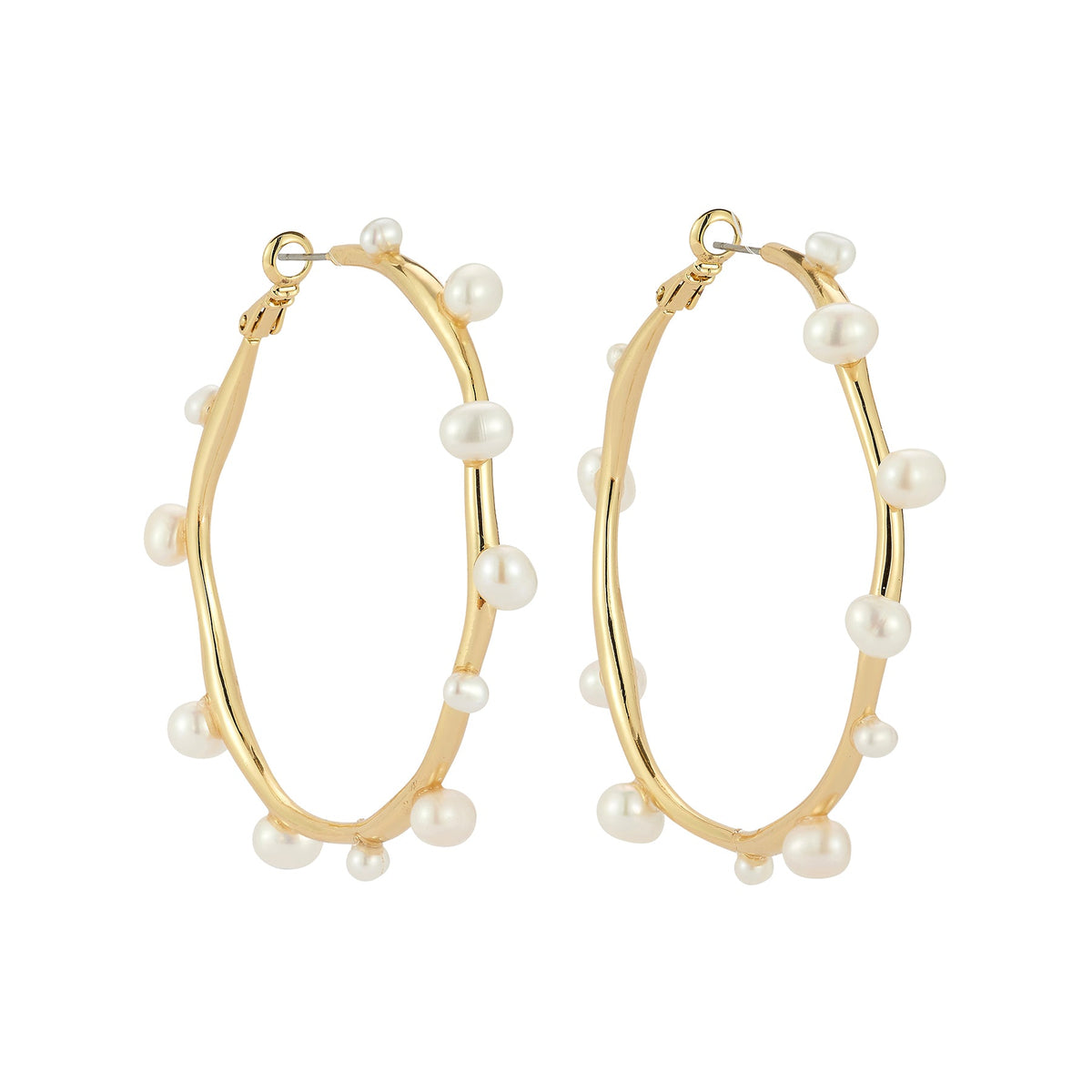 gold tone pearl hoop earrings featuring a sculptural design with asymmetrical freshwater pearls.
