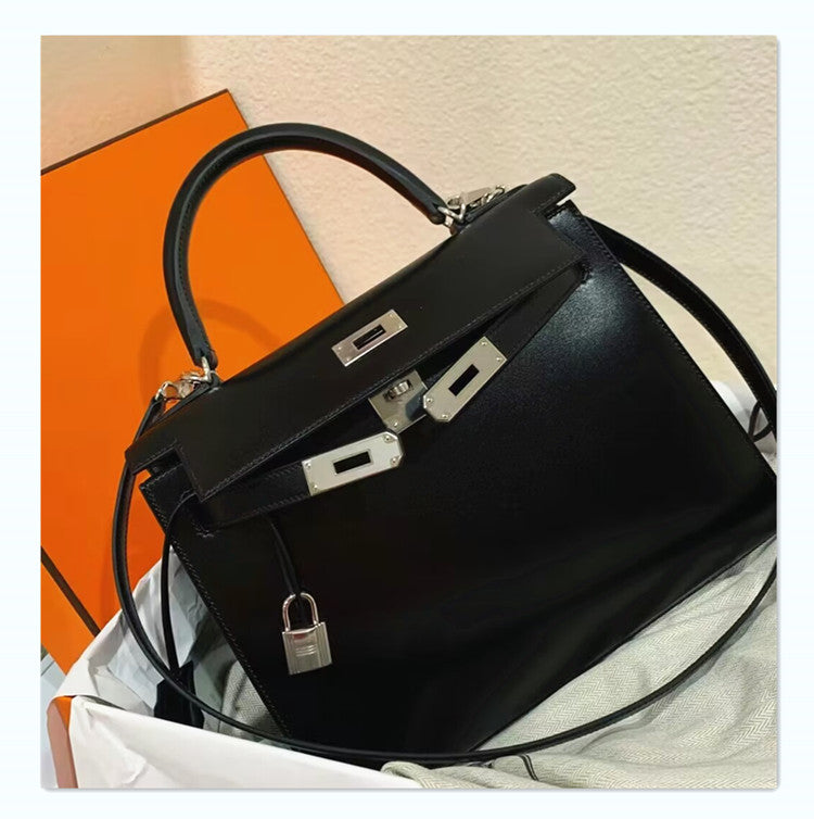 Women’s Glossy Leather Lock Shoulder Bag