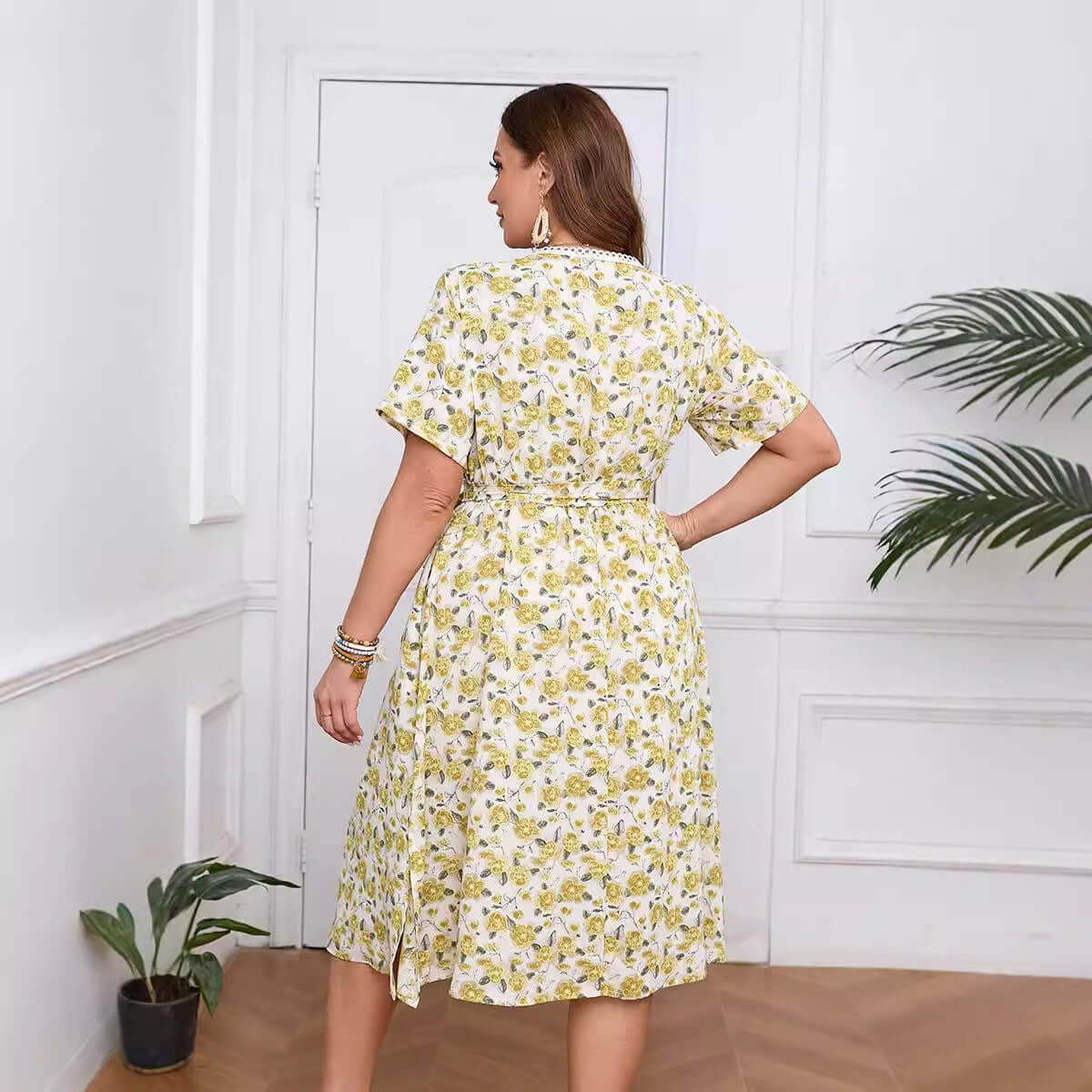 Plus-Size V-Neck Floral Midi Dress showcasing yellow floral pattern and A-line silhouette, perfect for summer womens fashion.