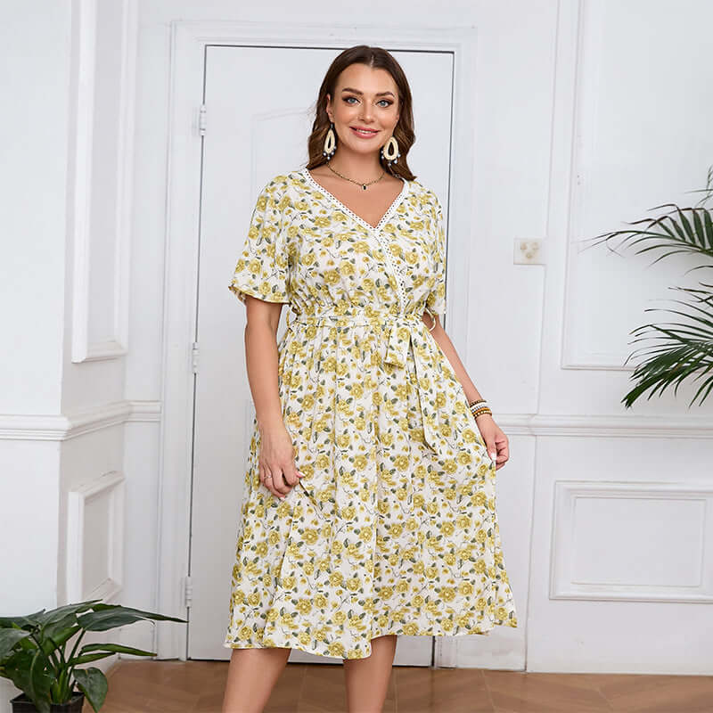 Plus-Size V-Neck Floral Midi Dress featuring a yellow floral pattern, A-line silhouette, and belted waist, perfect for womens fashion.