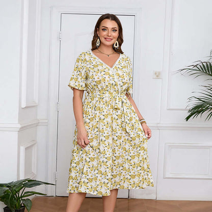 Plus-Size V-Neck Floral Midi Dress featuring a yellow floral pattern, A-line silhouette, and belted waist, perfect for womens fashion.