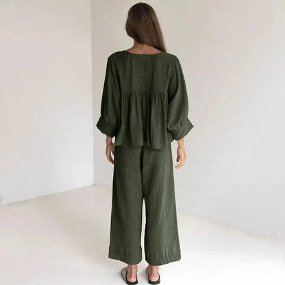 Women's cotton v-neck pajama set in olive green, featuring a relaxed fit and comfortable style for lounging.