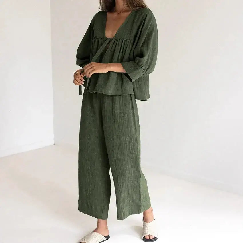 Women's cotton v-neck pajama set in olive green, featuring a relaxed fit and stylish two-piece design.