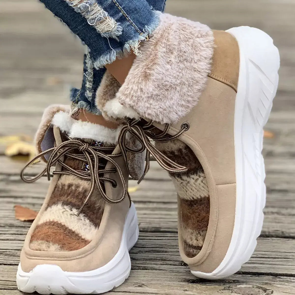Warm fur lined ankle boots with soft fluff interior and durable rubber sole, perfect for stylish comfort.