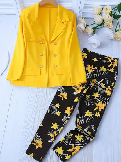 womens printed pants suit featuring a yellow jacket and floral printed black pants on a white surface.