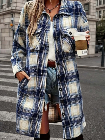women's plaid shacket outfit featuring an oversized flannel shirt-jacket, styled with denim shorts and a coffee.