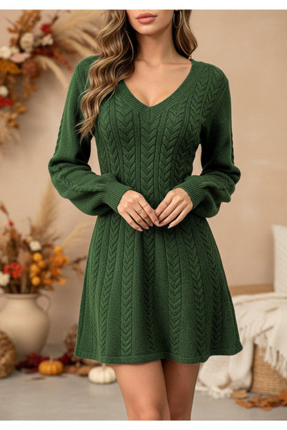 Model wearing an army green cable-knit V-neck pullover dress