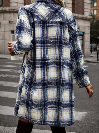 women's plaid shacket outfit featuring a stylish oversized flannel shirt in blue and cream colors.