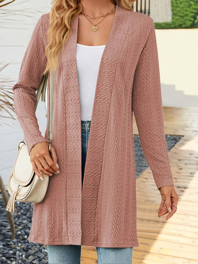Women's knit cardigan in soft pink, featuring a button-down design for comfortable layering and effortless style.