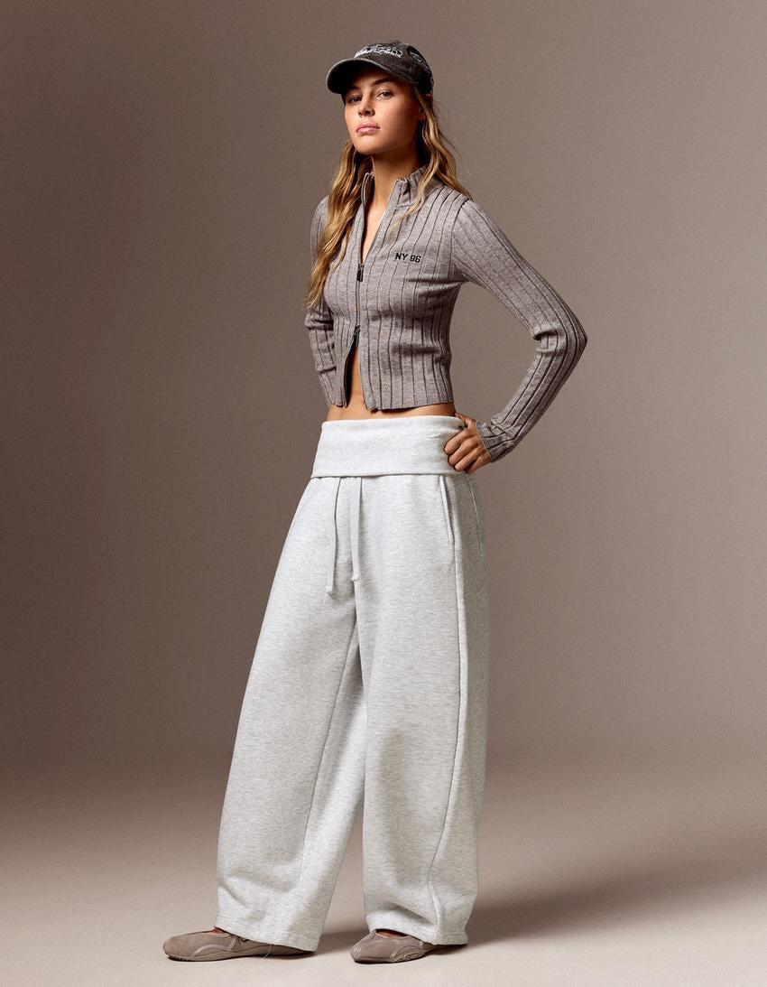 Full-length view of the gray high-waist wide-leg casual pants on a model