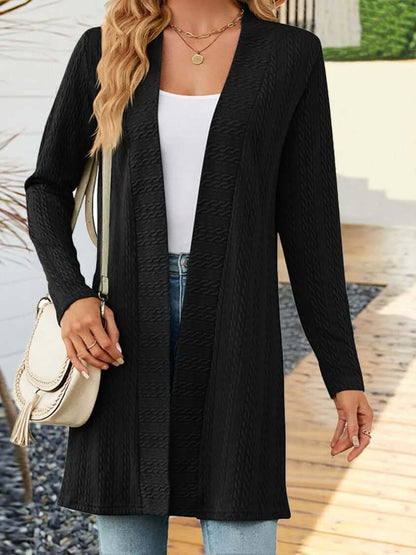 Women's knit cardigan in black, featuring a relaxed fit and button-down design, perfect for stylish layering.