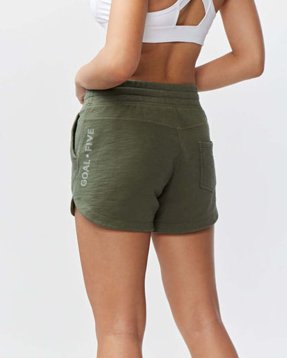 Freasy Garment-Washed Cotton Shorts in olive green, featuring a relaxed fit and wide rib-knit waistband.